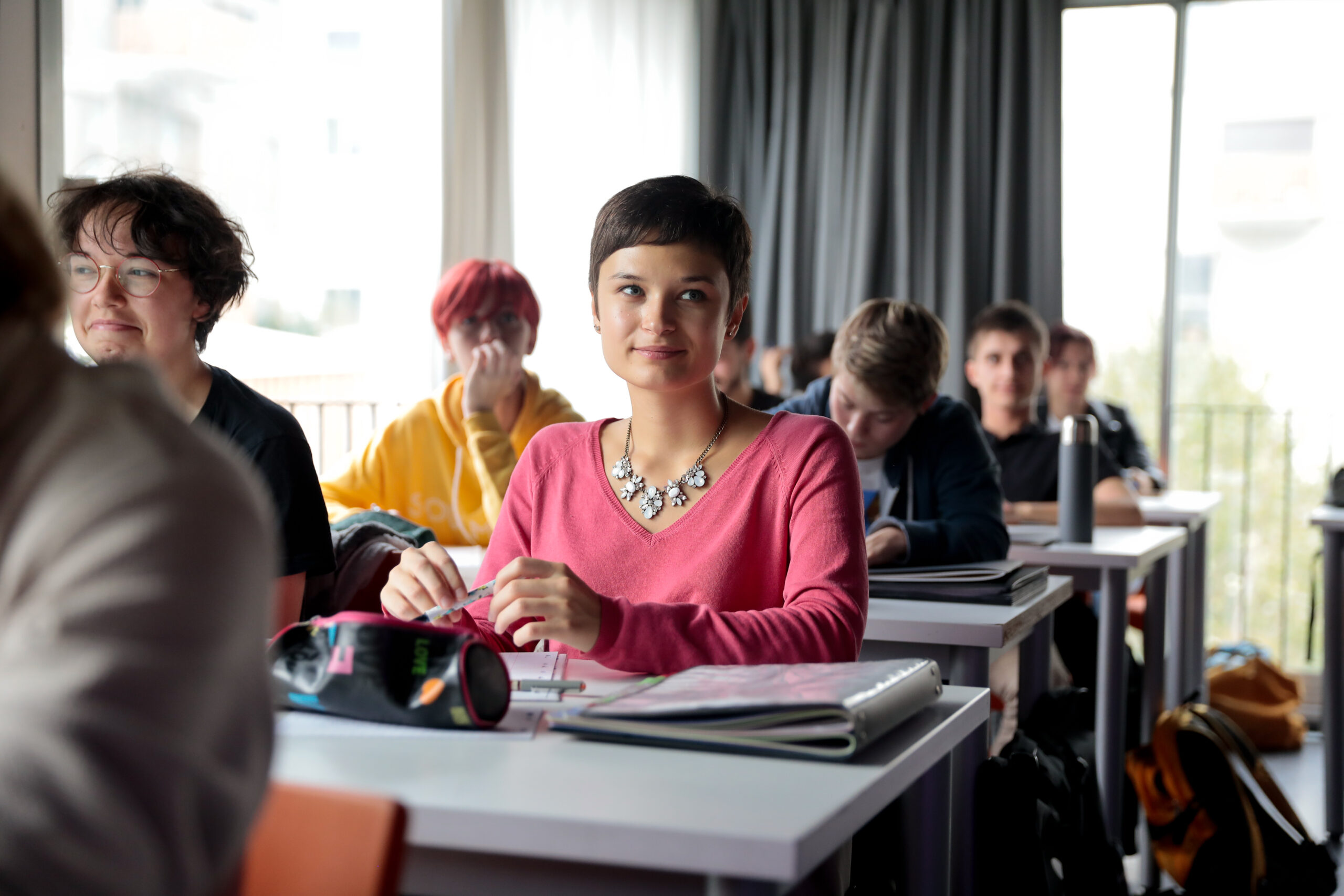 ESMA student in class with her classmates during a lesson