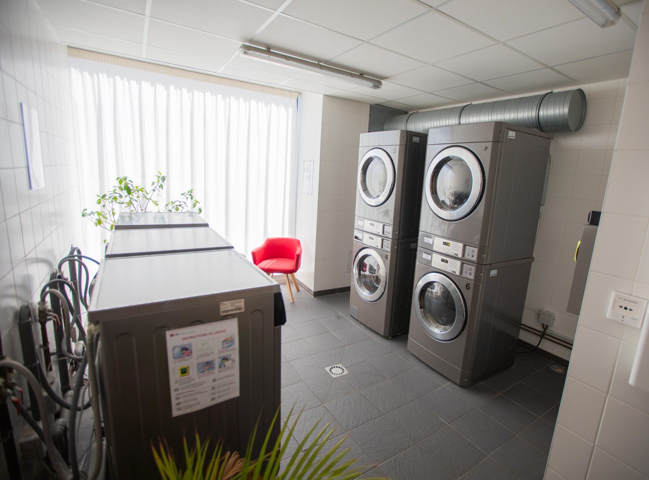 Laundry room in the Artemisia Rennes student residence with washing machines