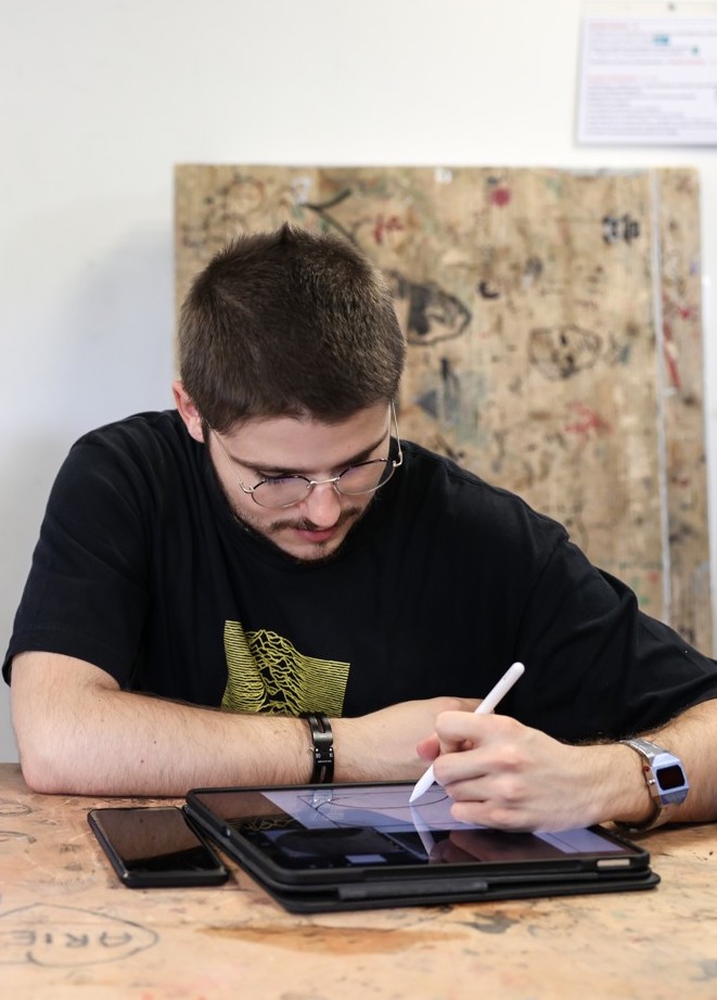 ESMA 3D Toulouse student working on a digital graphics tablet