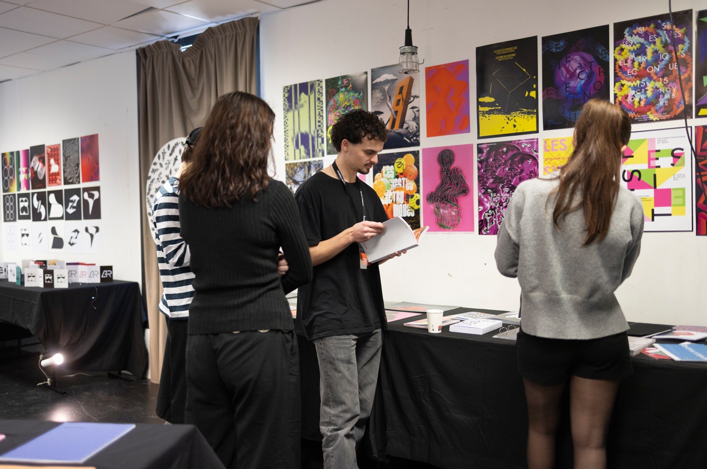 ESMA students presenting their graphic work at the Open Days